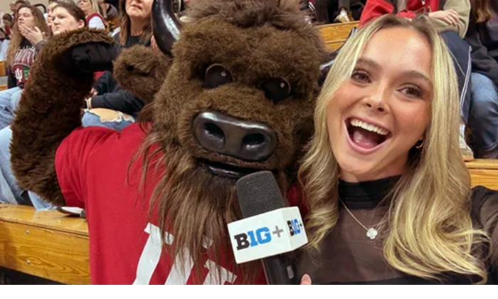 Josie with Big Ten Plus microphone and IU mascot
