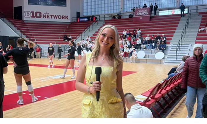 Josie reporting at Big Ten volleyball game