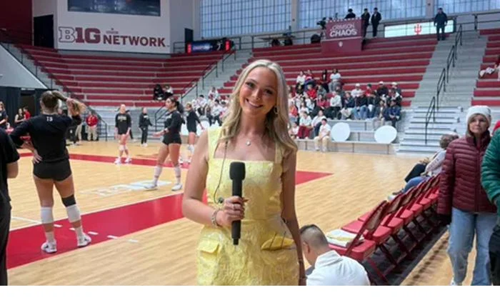 Josie reporting at Big Ten volleyball game